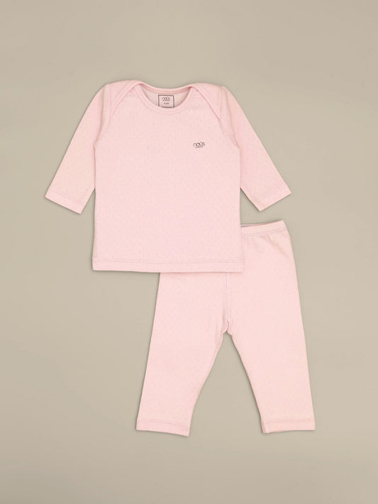 Camicia e pantaloni rosa a maniche lunghe